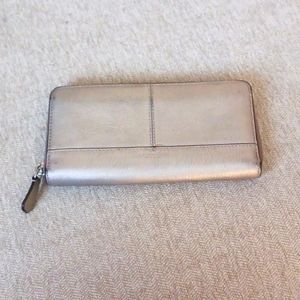Coach metallic bronze leather zip wallet